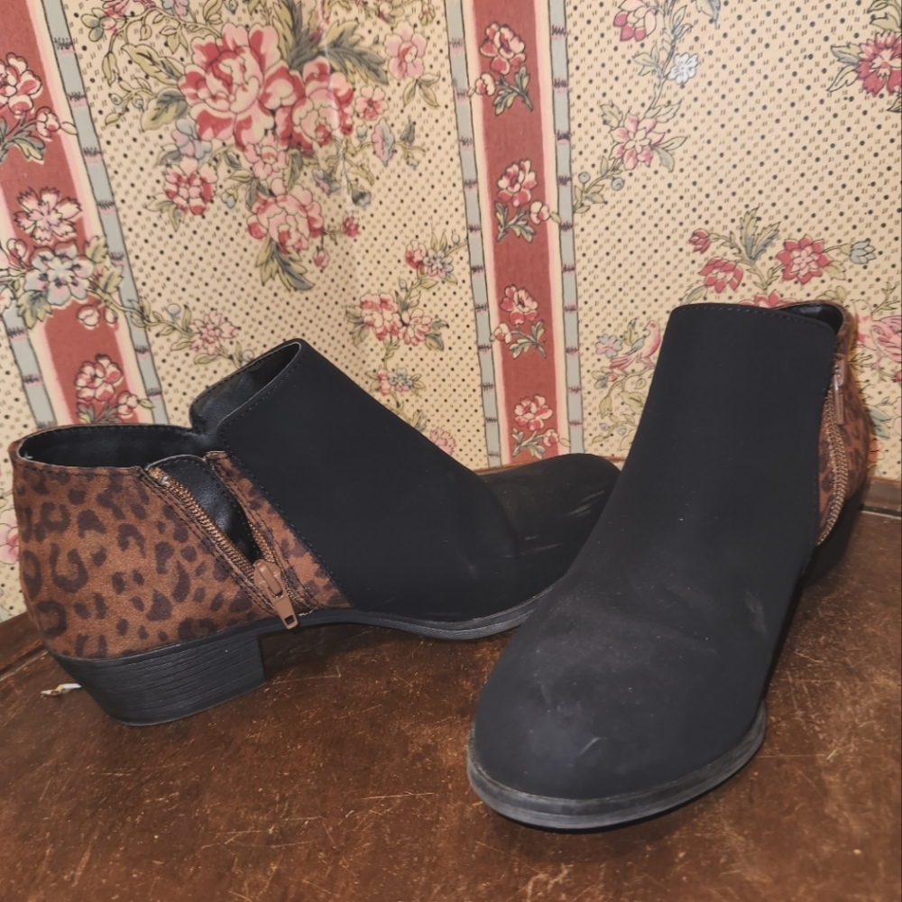 Black booties with cheetah print detail